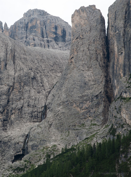 The route of day one: up the face to the right of the waterfall, around the back of the tower, then over the bridge between the tower and the main cliff. © Haydn Williams 2012